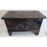 Antique style fuel bin in the form of a carved oak planked coffer (52cm x 28cm x 34cm)