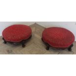 Pair of Victorian mahogany circular upholstered top footstools with shaped apron and carved cabriole