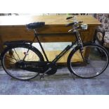 Gents Raleigh cycle, with chromed rod brakes, green frame with three speed gears and dynamo , and