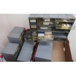 Five watch makers drawer cabinets containing selection of movements, glasses, parts for Omega,