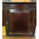 Small George III pine and elm spice cabinet, with two drawers and panel door (38cm x 41cm x 20cm)