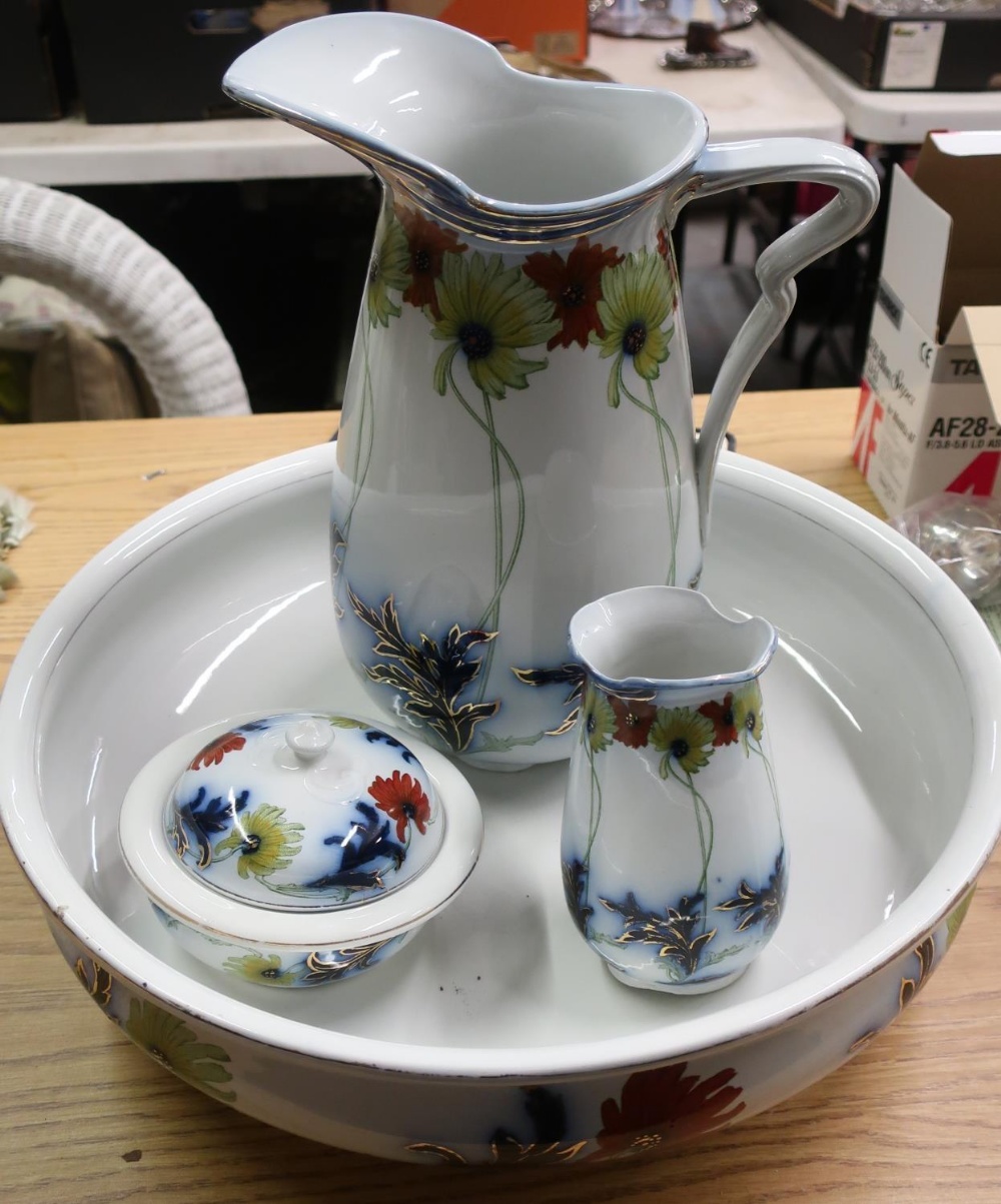 S W Dean, Burslem daisy pattern washstand set printed and enameled with flowers, comprising of