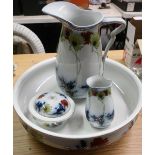 S W Dean, Burslem daisy pattern washstand set printed and enameled with flowers, comprising of