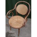 Bentwood carver chair with circular bergere seat and back