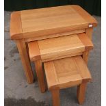 Modern nest of three golden oak occasional tables