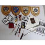 Selection of various Masonic medals, including steward badges, Masonic lodge books, silver Masonic