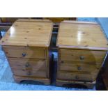 Pair of pine Ducal three drawer bedside chests