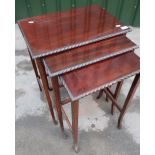 Early 20th century mahogany nest of three tables