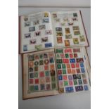 Victory stamp album containing a selection of stamps including Victorian and later GB and a Globe