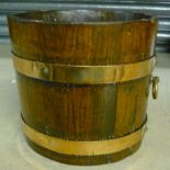 Coopered oak planter with two copper bands and ring handles