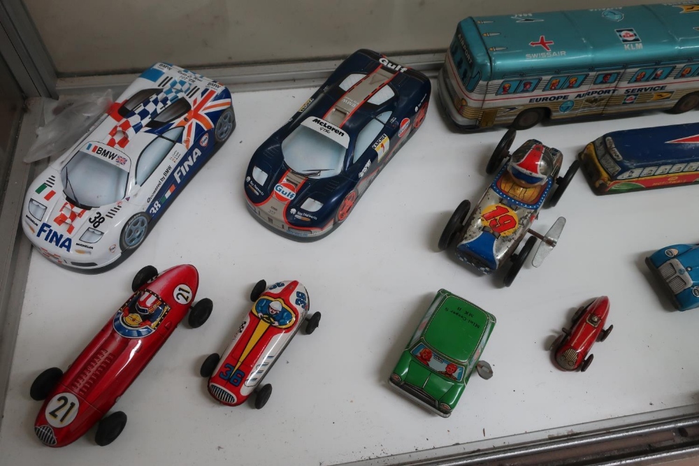 Collection of friction and clock work tin plate model vehicles including GTP motorways coach, SAS