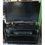 Panasonic TX-L32G10B flat screen TV and a Panasonic DMR-EZ48V DVD and VCR player