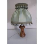 Yorkshire Oak; a Derek 'Lizardman' Slater table lamp with pineapple leaf carved decoration (36cm