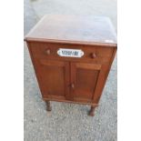 Early 20th C oak Veterinary cabinet with single drawer above two cupboard doors, on barley twist