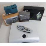 Pure Evoke-One DAB digital radio, a John Lewis DAB radio, a Roku streaming stick, Sky remote etc (