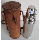 Vintage silver plated large thermos flask in tan leather carry case