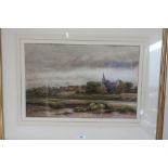 English school early 20th C, an extensive river landscape with cows, a church beyond, watercolour,