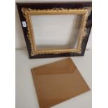 19th c gilt wood and gesso picture frame with pierced and scroll cresting, in velvet lined