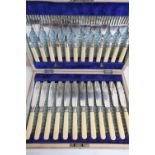 Set of twelve EPNS bone handled fish knives & forks with hallmarked silver collars, in fitted case