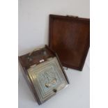 Victorian walnut coal box, slope front decorated with a brass panel embossed with two exotic birds