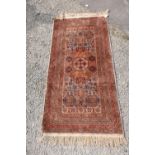 20th C middle eastern traditional pattern wool rug with central medallion and geometric pattern
