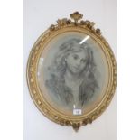 19th century half length portrait of a young girl, pencil with white, oval in giltwood and gesso