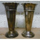 Pair of Geo. V hallmarked silver trumpet shaped vases, with shaped rims on stepped bases, (12cm)