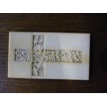 Early 20th C Chinese carved ivory card case with central carved crucifix panel (5.5cm x 9.5cm)