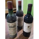 Bottle of Cosd'esto Estournel 1960, Saint-Estephe Bordeaux 1990 Cotes De Castillon, and a bottle