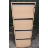 Light wood four drawer filing cabinet