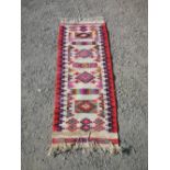 Native hand woven Indo Persian rug, beige ground with four multicoloured medallions and red