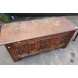 Old Charm Furniture oak blanket box with panelled front and sides