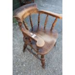 Modern elm smokers bow elbow chair with double H shaped under-stretcher and turned supports