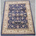 Heritage traditional pattern acrylic carpet blue and cream ground (160cm x 120cm)
