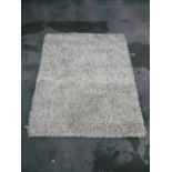 Tufted beige wool rug (156cm x 210cm)
