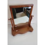 Victorian mahogany dressing table mirror with scroll shaped arms and serpentine base on bun feet