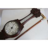 20th C aneroid barometer with thermometer, in carved oak case, by Fattorini & Sons Bradford, and a