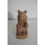 Russian carved soft wood model of a bear, inscribed Moscow 1973 (18.5cm high)