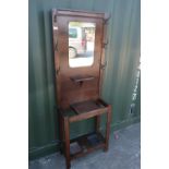 1930s oak hall stand with central mirror panel and lift up central compartment (61cm x 28cm x 175cm)