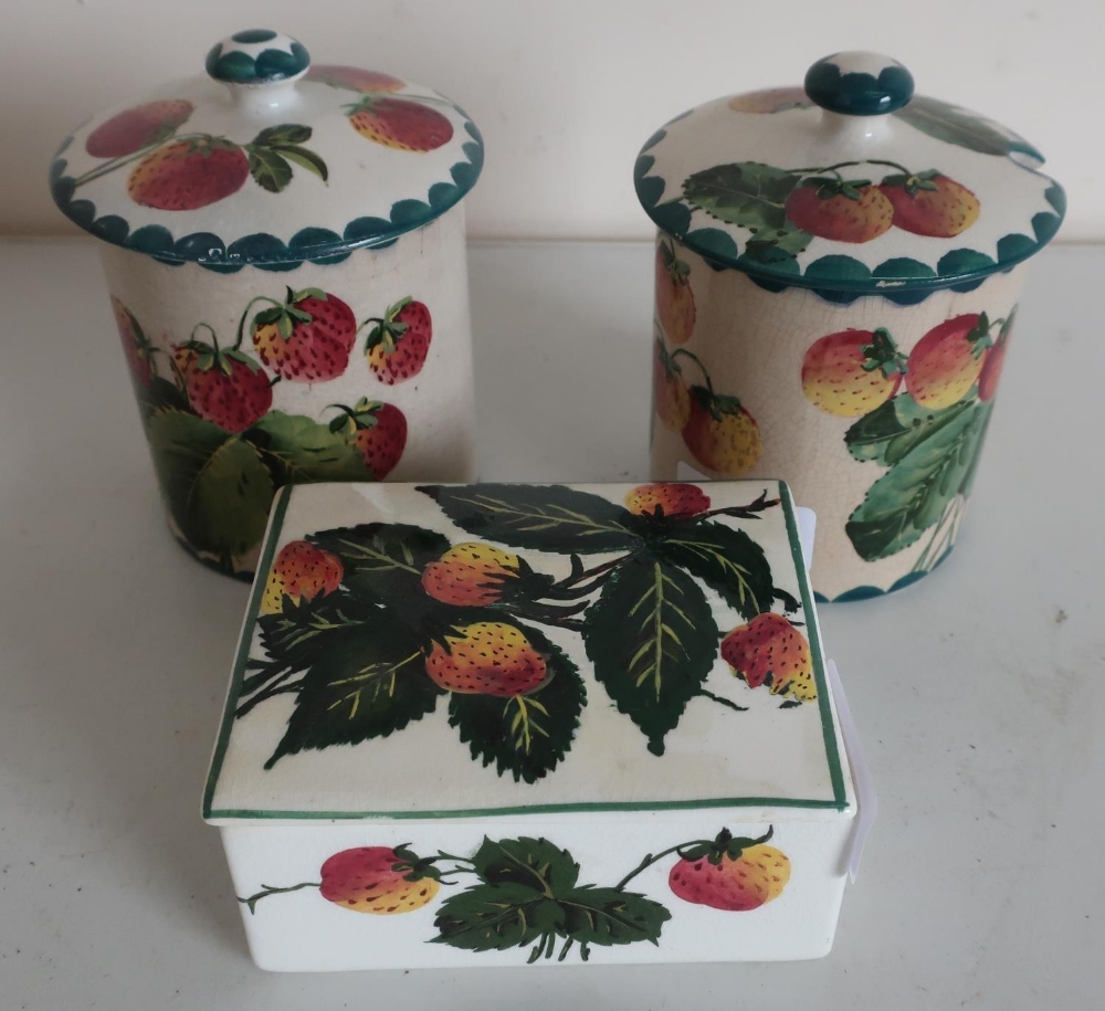 Two Wemyss Pottery strawberry pattern preserve jars (approx height 12.5cm) with signed and impressed