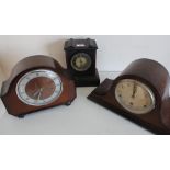 Victorian black slate and red marble mantel time piece, with black Roman dial, 1973 British Railways