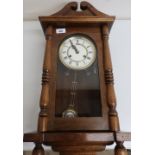 Modern mahogany cased wall clock