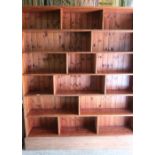 Extremely large pine multi tier and sectional bookcase (183cm x 33cm x 216cm)