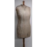 Early 20th C female dressmakers torso dummy on turned wood stand and three out-splayed supports