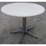 Cream painted circular top dining table on metal base (diameter 104cm)