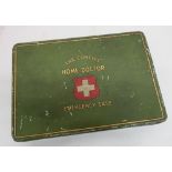The Concise Home Doctor emergency case First Aid kit, in green tin with gilt detail, complete with