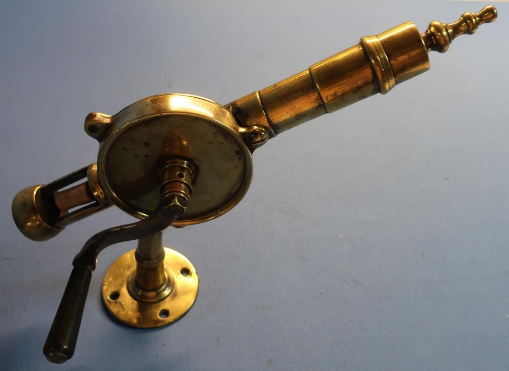 Large 19th C bar mounted brass Rotary corkscrew engraved Hicks & Reynolds Troy New York (35cm high)