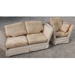 Modern traditional style two seat knoll sofa in cream and gold diamond check upholstery, with