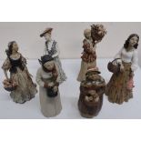 Group of six studio pottery female figures, mostly with baskets, of various styles (approx height