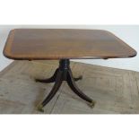 Regency mahogany rectangular breakfast table, satinwood banded tilt-top, on four